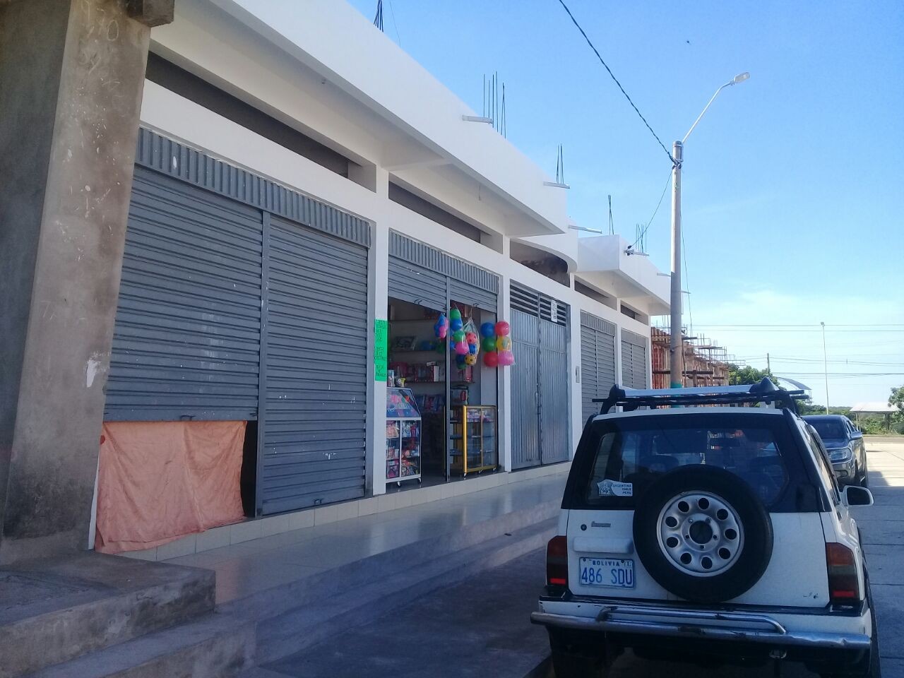 Local comercial en VentaDoble vía la Guardia frente del mercado campecino  Foto 2