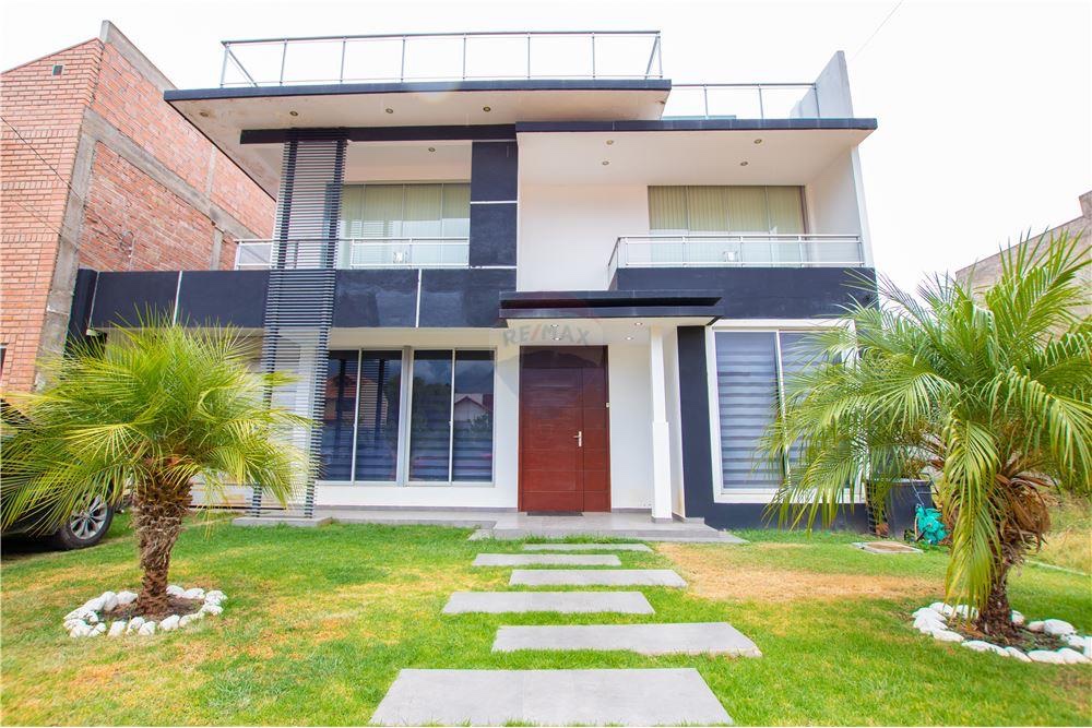 Casa CASA EN VENTA EN CONDOMINIO SAN HUMBERTO TIQUIPAYA Foto 1